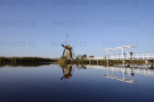 Historic windmill and drawbridge, UNESCO World Heritage Site, Kinderdijk, South Holland,