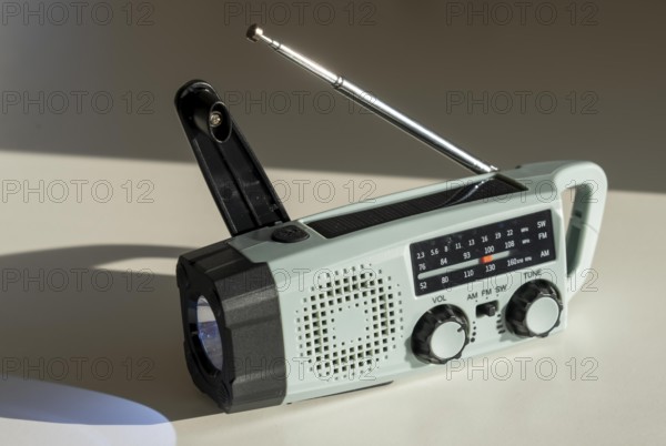 Radio with crank mode, by turning the crank we generate electricity in a dynamo, which charges a