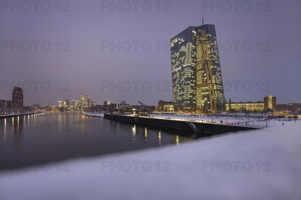Snow lies along the banks of the Main from the European Central Bank (ECB) to the Frankfurt banking