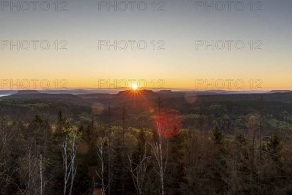 Sunrise at Bernhardstein viewpoint with views of Pfaffenstein and Gohrisch, Saxon Switzerland,