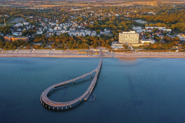 Aerial view over Maritim Seebrücke / maritime pier over the Baltic Sea at seaside resort
