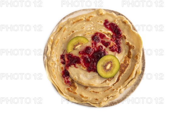 Stack of Plain Fried pancakes with jam and kiwi Isolated on white background. top view, flat lay,