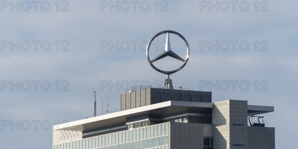 Modern building with Mercedes-Benz logo under cloudy sky, Mercedesstern, Stuttgart-Untertürkheim,