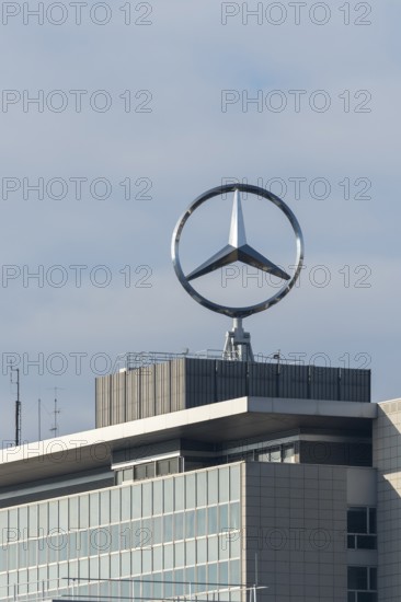 Mercedes-Benz logo over a modern building with blue sky, Mercedes Star, Stuttgart-Untertürkheim,