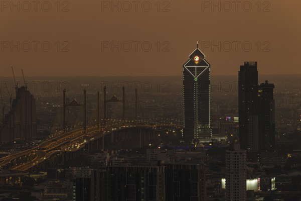 Over the rooftops of Bangkok, evening light, view from the Moon Bar on the roof terrace of the