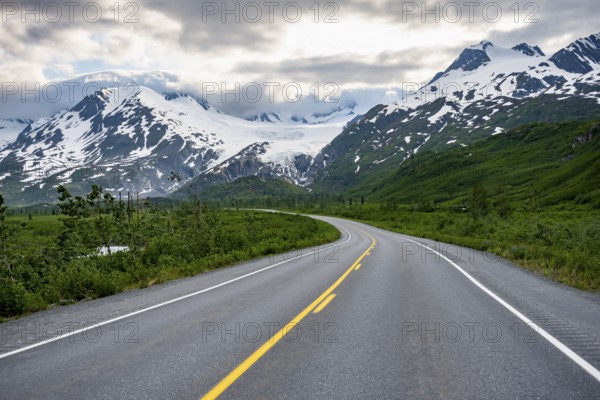 Road through mountain landscape, picturesque landscape with Worthington glacier, dramatic cloudy