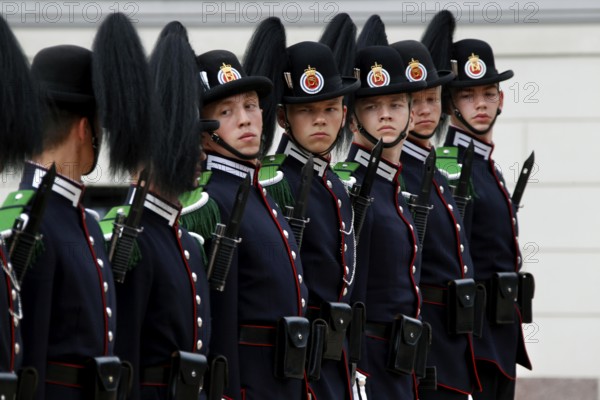 Ceremonial changing of the guard with soldiers in uniform at the Royal Palace in Oslo, Oslo,