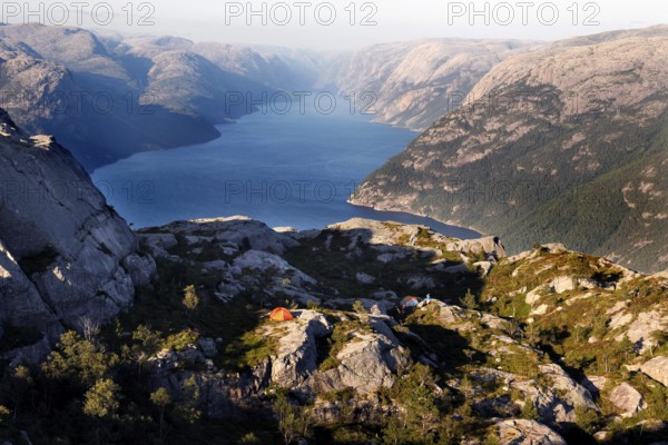 A stunning view of the deep blue Lysefjord from the heights of Preikestolen, Lysefjord, Rogaland,