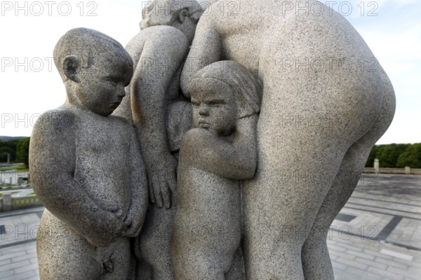 Group of granite figures with a group of children and adults in close contact, Oslo, Norway