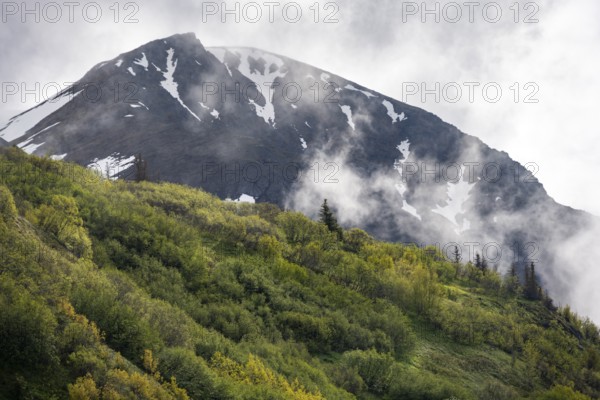 Fog sweeps around mountain peaks, Slaughter Ridge Trail, Cooper Landing, Kenai Peninsula, Alaska,