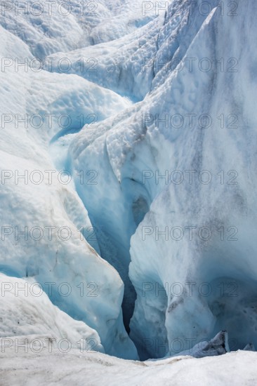 Waterfall in a crevasse on the ice of Root Glacier, Wrangell St. Elias National Park, Alaska, USA