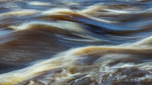 Waves on the water of the Hunte River, Goldenstedt, Lower Saxony, Germany