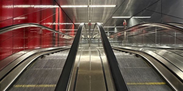 Artwork titled Three Model Spaces by Ralf Brög, escalators at Heinrich-Heine-Allee subway station,