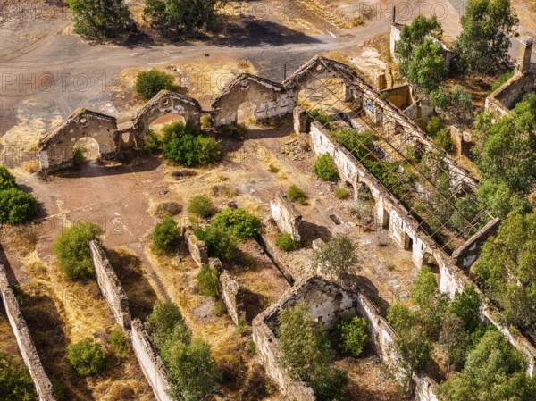 Ruins of former workshop halls, Mina de Sao Domingos, historic copper open-pit mine, aerial view,