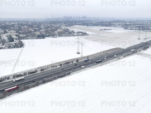 The fields in the north-west of Frankfurt am Main covered in snow. (Aerial view with a drone) On