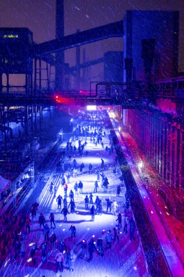 Ice rink at the Zollverein coking plant, ice skating with music and many lighting effects, Essen,