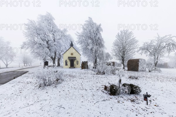 Schoenstatt Chapel Ennabeuren with hoarfrost in winter. Tourist attraction in the Swabian Jura.