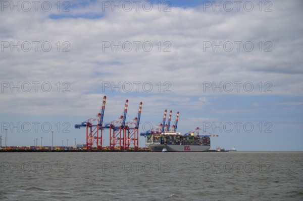 The container ship OOCL Germany with 59 m width and 400 m length of one of the largest container
