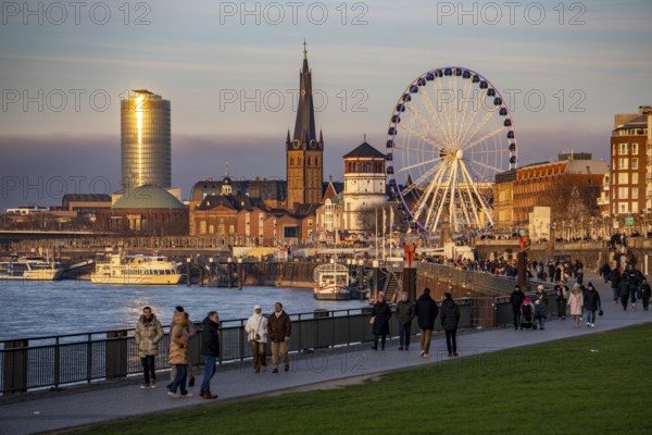 Rhine promenade in Düsseldorf, Ferris wheel, old castle tower, St. Lambert Basilica, old town, ERGO