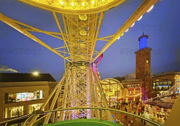 View of the town hall tower with the Christmas market from a Ferris wheel gondola, Hagen, Ruhr