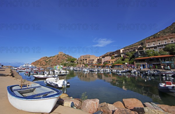 Boats in Port de Porto or Port of Porto on the Porto River, behind the Genoese Tower, Porto, Ota,