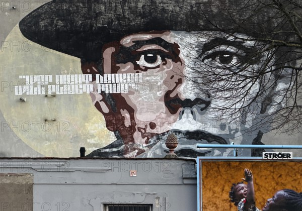 Wall painting of orticanoodles with the portrait of Joseph Beuys and his bon mot Wer nicht denken