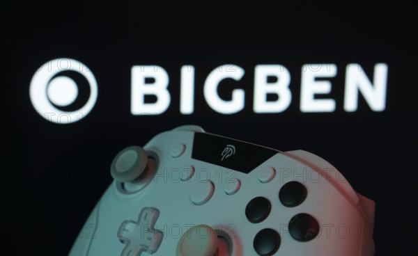 Dhaka, Bangladesh- 20 Mar 2025: A close-up of a white gamepad with the Bigben Interactive seen on