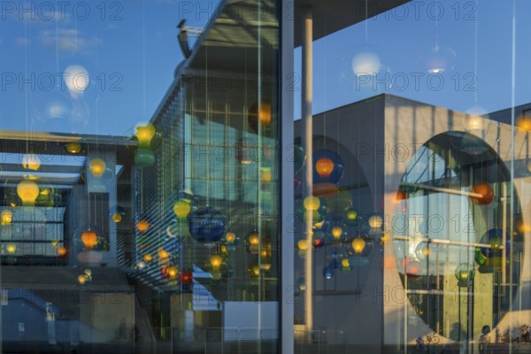 Artistic lamp installation with window reflection of the Marie-Elisabeth-Lüders House, art,