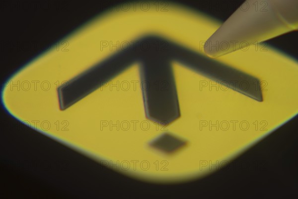 Dhaka, Bangladesh- 06 Dec 2025: Close-up of the Expedia app on a screen with a stylus pointing at