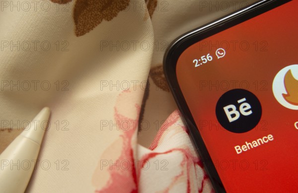 Dhaka, Bangladesh- 07 May 2025: Behance app icon is seen on smartphone