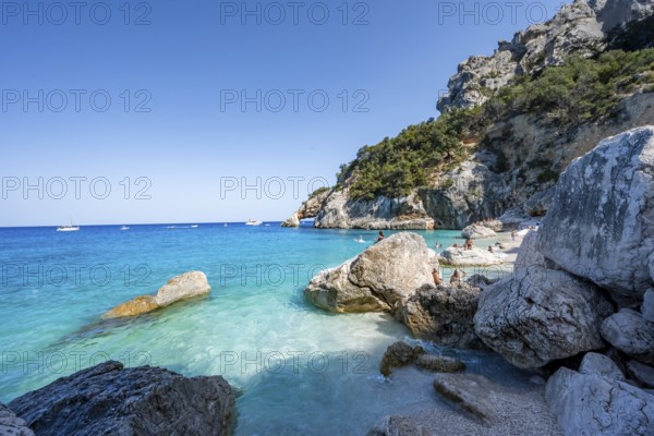 Light blue clear sea on a dream beach on Cala Goloritzé, picturesque rocky coast, cliffs with rock