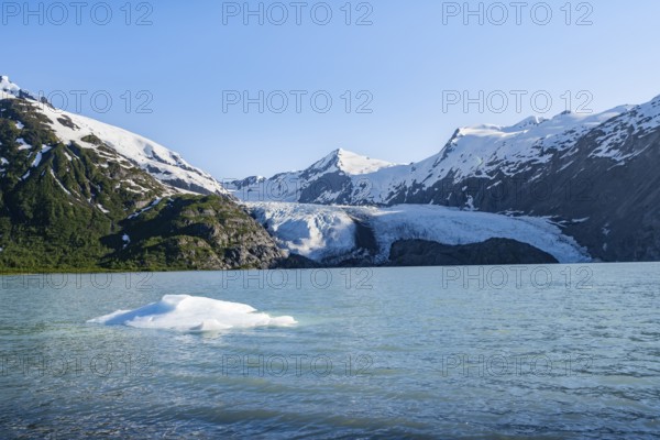 Snowy mountains and glaciers Portage Glacier on Portage Lake glacial lake, Chugach National Forest,