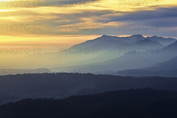 View of the Jura foothills from the Gisliflue, in the light of the setting sun, Talheim, Canton,