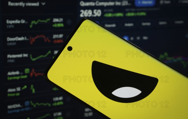 Dhaka, Bangladesh- 18 March 2025: Yubo logo is displayed on a smartphone screen, with a stock graph