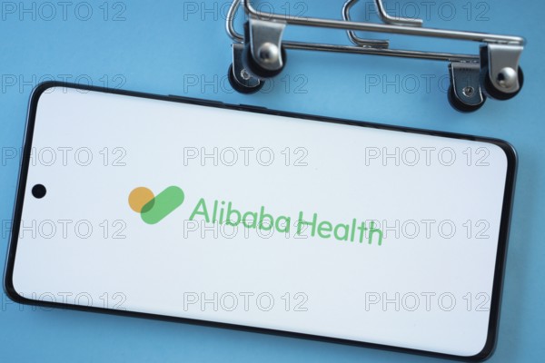 Dhaka, Bangladesh- 21 Nov 2025: Smartphone screen showing the Alibaba Health logo with shopping