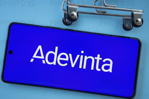 Dhaka, Bangladesh- 03 July 2025: Smartphone screen showing the Adevinta logo with shopping cart