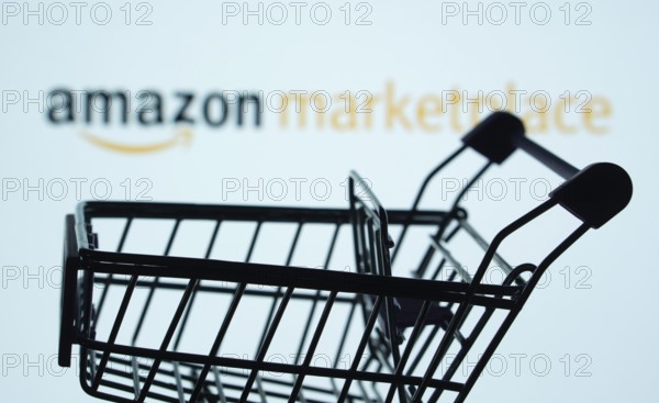 Dhaka, Bangladesh- 21 Nov 2025: Silhouette of a shopping cart in front of the amazon marketplace
