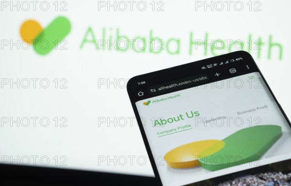 Dhaka, Bangladesh- 21 Nov 2025: Smartphone displaying Alibaba Health web interface against Alibaba