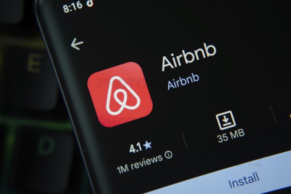Dhaka, Bangladesh- 21 Nov 2025: Airbnb app from Google Playstore is displayed on a smartphone
