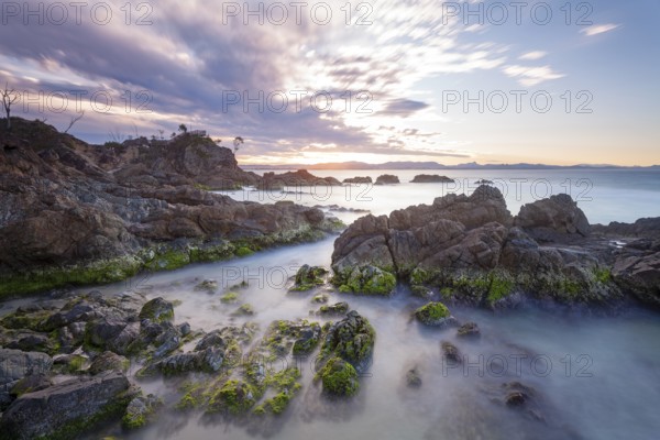 Sunset at Fisherman's Lookout. Dramatic waves and coastal scenery at The Pass, New South Wales,