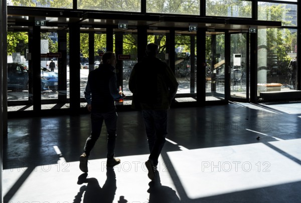 Foyer in a building of the Technical University of Berlin, light and shadow from people at the