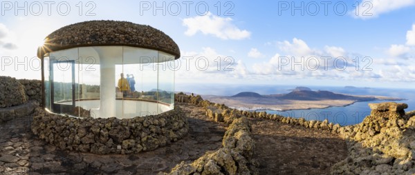 Stairway and viewing platform at the Mirador del Río viewpoint, in the evening light with sun