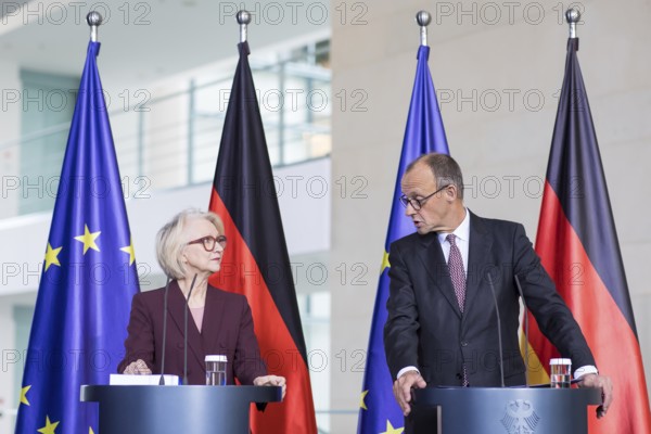 Prof. Dr. Monika Schnitzer (Chair of the Council of Experts) and Friedrich Merz (Federal Chancellor