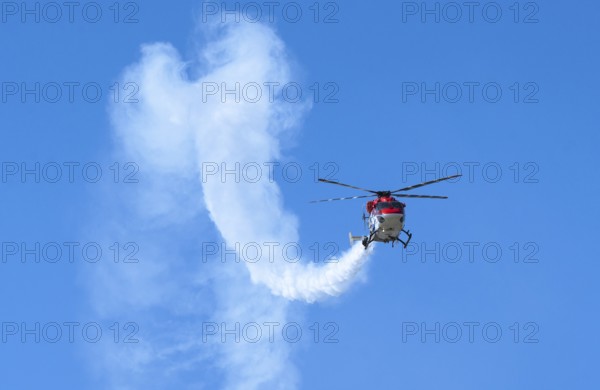 Indian Air Force aerobatic team performs during rehearsals ahead of the air show organised as part