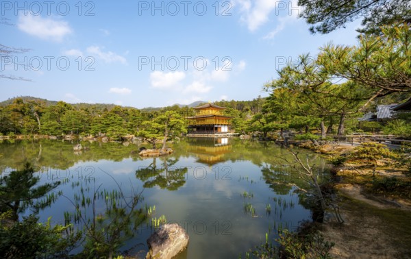 Golden Pavilion reflected in pond, Japanese garden, Golden Pavilion Temple, Kinkaku-ji reliquary,