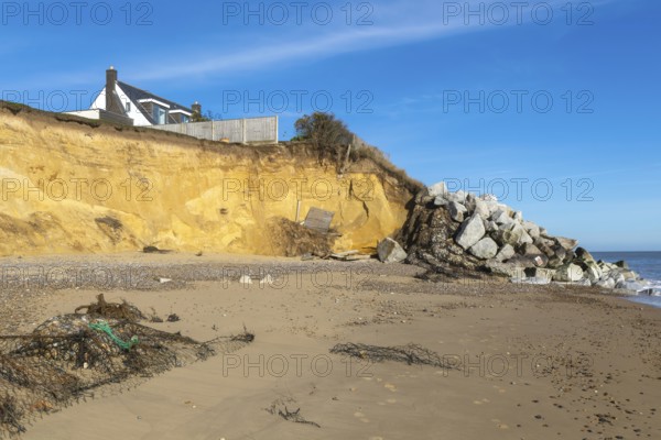 Clifftop houses at risk from coastal erosion, Thorpeness, Suffolk, North Sea coast, England, UK