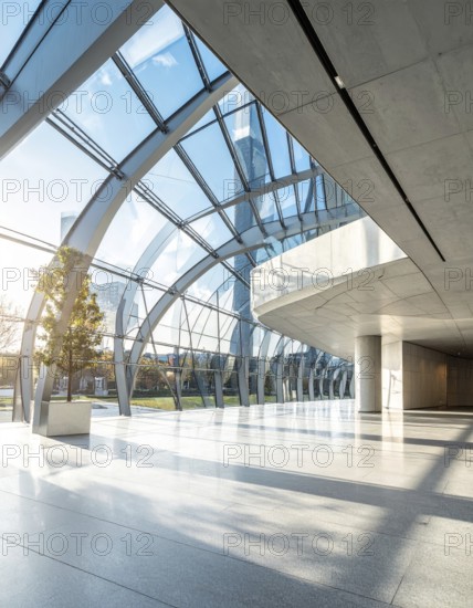 Modern architectural framework with glass and steel structure, glass facade with a greed of steel
