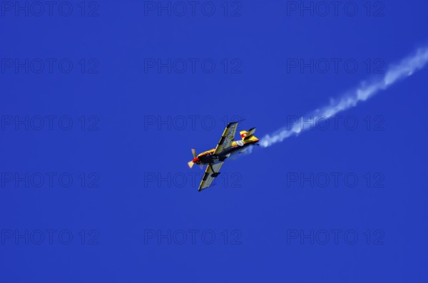 A Votec 351 sport aircraft from the Swiss MSW Aviation AG with registration HB-YMV during a flight