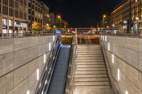 Night photo, long exposure with motion blur, modern underground entrance at Unter den Linden