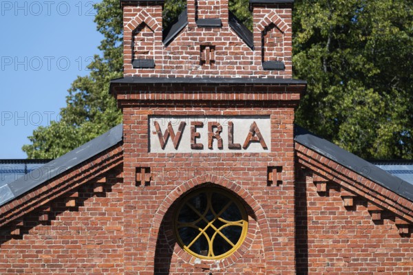 Brick façade with inscription Werla, former paper factory and mill for the production of groundwood